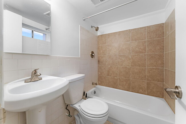 Full bathroom with vanity, tub & shower; ceramic tile flooring - 3233 Apex Cir