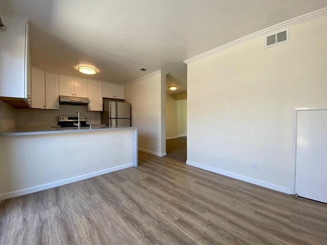 Building Photo - Newly Renovated Condo with NEW KITCHEN! - ...