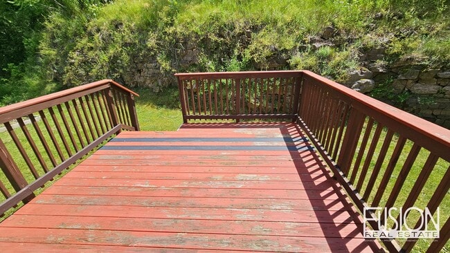 Building Photo - FREE July Rent for this Quiet, Four Bedroo...