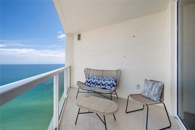 Building Photo - 16699 Collins Ave