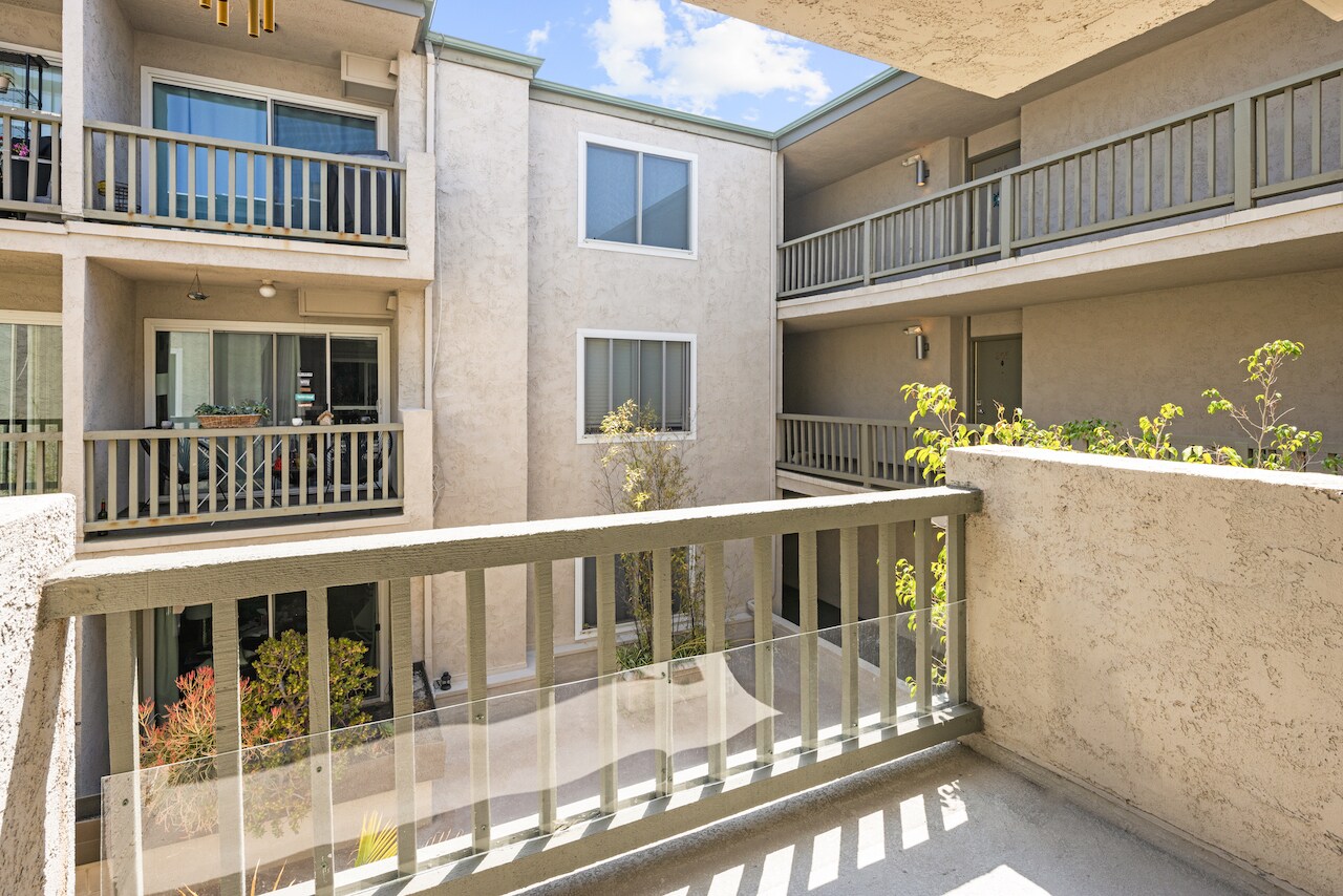 Balcony off living room- overlooks quiet courtyard - 8740 Tuscany Ave