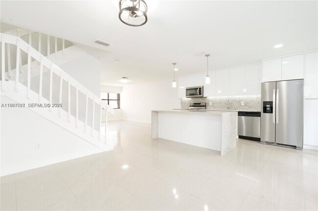 Building Photo - 6080 W 26th Ct