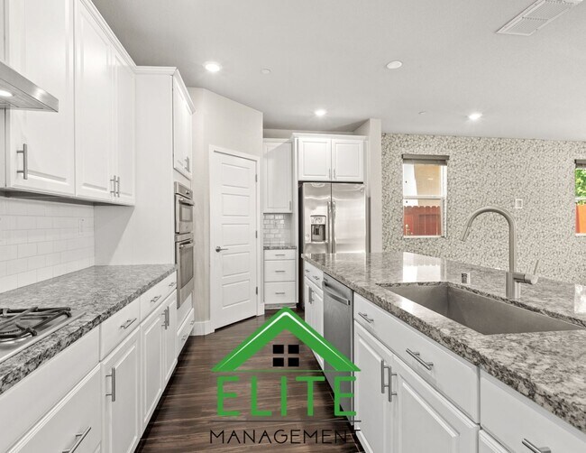 Building Photo - **Modern single-family residence in the hi...