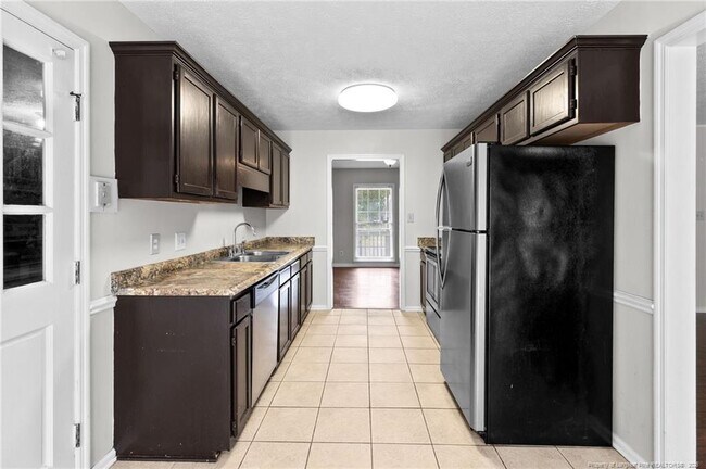 Building Photo - 6924 Woodmark Dr