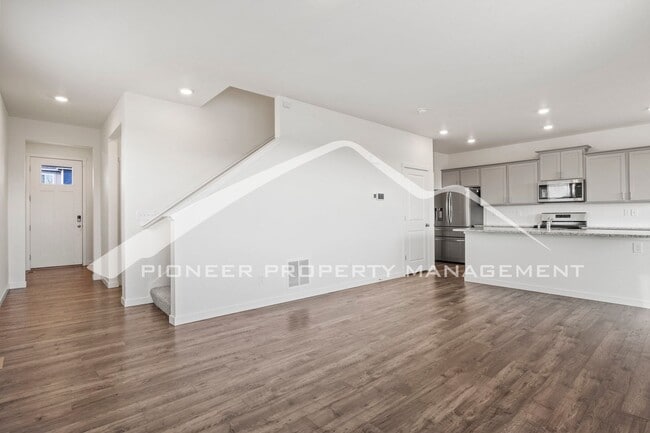 Building Photo - Modern 4-Bed, 2.5-Bath Home with 2 car garage, AC and Private Enclosed Yard