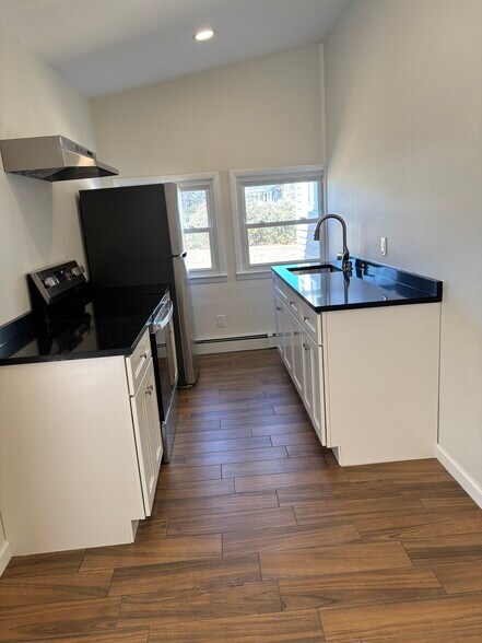 Upper cabinets will be installed by 08/01/2025. - 860 Waverly Ave