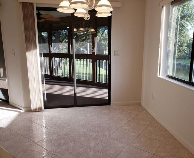 Building Photo - Beautiful Pond Front 2 Bedroom 2 Bath Townhome in the Wood Haven Community