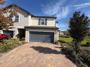 Building Photo - Stylish 2BR Corner Unit in Ocoee with Attached Garage, Quartz Kitchen & Prime Location