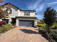 Building Photo - Stylish 2BR Corner Unit in Ocoee with Attached Garage, Quartz Kitchen & Prime Location