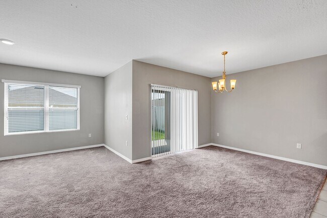 Building Photo - Sunny, Move-In Ready 4-Bed Home in Winter Haven with Modern Finishes and Two-Car Garage