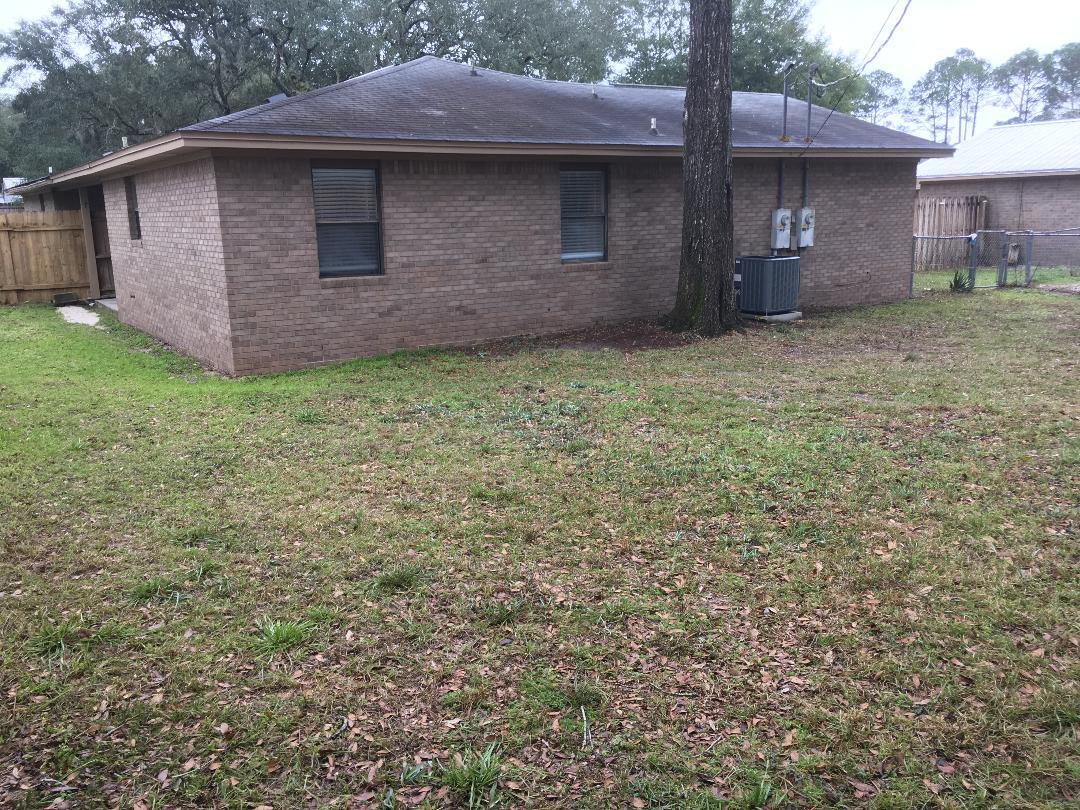 Back of unit from corner of yard - 101 Harding Rd