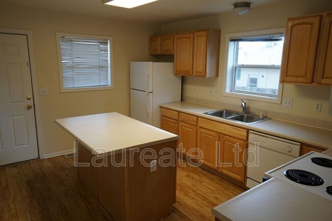 Building Photo - 6062 E 62nd Ave
