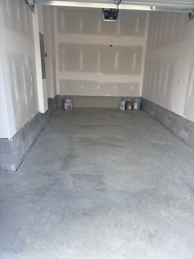 Building Photo - **BE THE LUCKY ONE TO LIVE IN THIS 2024-BUILT END-UNIT TOWNHOME IN A RESORT-STYLE COMMUNITY**