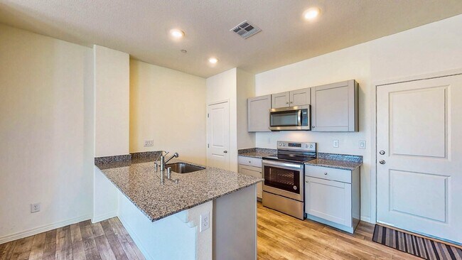 Building Photo - Cozy 2-story, 3BR 2BA townhome in a new community in North Las Vegas.