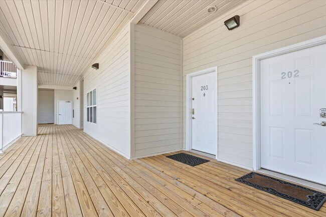 Building Photo - Riverfront Living with Spacious Layout and...