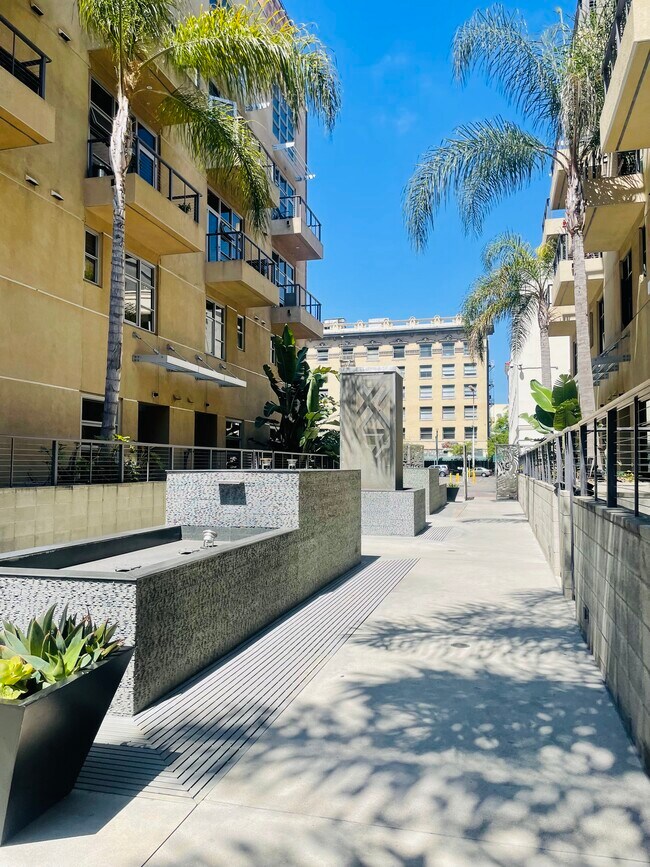 Fountains between buildings - 133 The Promenade N