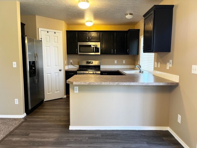 Building Photo - 4 Bedroom Home with Bonus Room Potential & RV Parking!