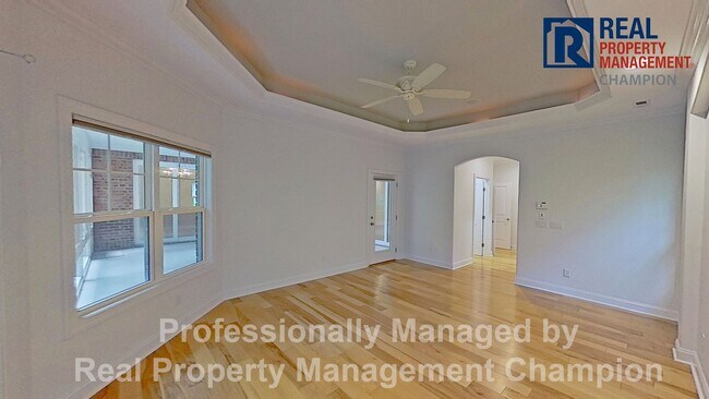 Building Photo - Custom 4BD/3BA Home with Hardwood Floors, Office, and Sunroom