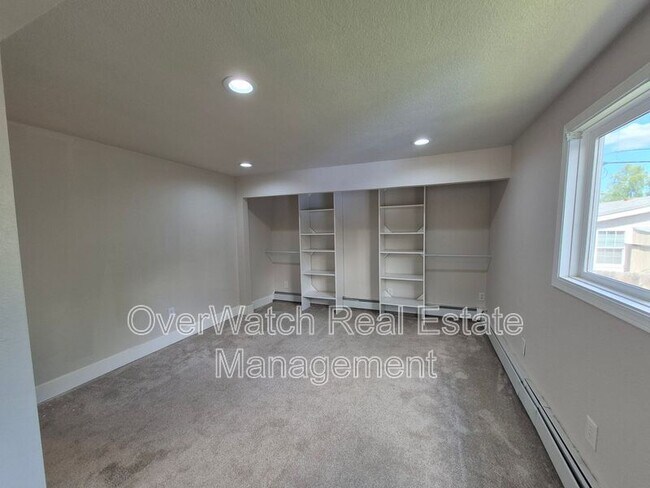 Building Photo - 8331 E 6th Ave