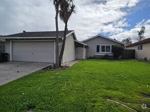 Building Photo - Single Family Home, Fresh Paint, Wood Floo...