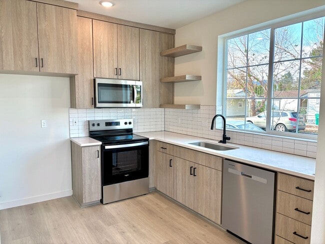 Building Photo - St. Johns New Build - Bright and Spacious End Unit 2 Bedroom with A/C, Washer/Dryer and Private P...