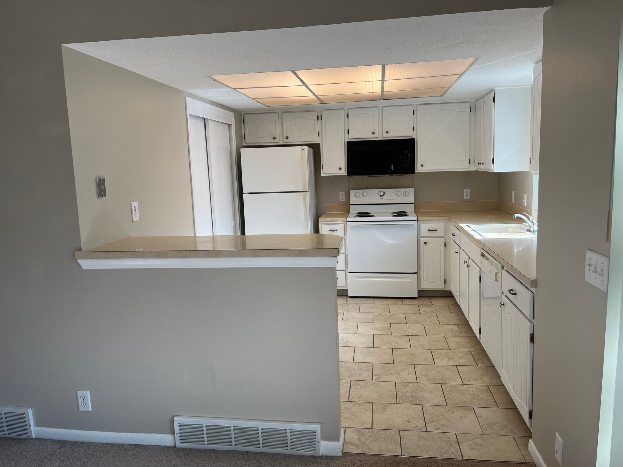 10/2025 painted kitchen cabinets and put on new hardware - 12063 Burdette Cir