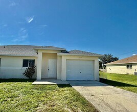 Building Photo - Spacious 3 Bedroom Duplex in Lehigh Acres