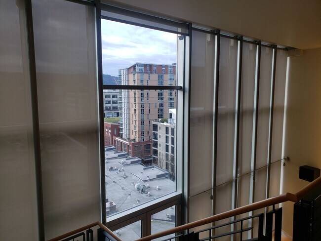 Building Photo - Wonderful Two story Penthouse Condo! Water...