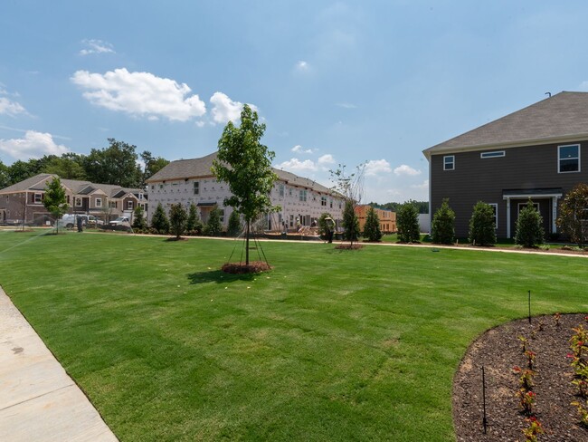 Building Photo - Brand New End-Unit Townhome in Popular Cha...