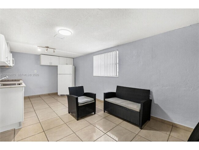 Building Photo - 6049 W 14th Ct
