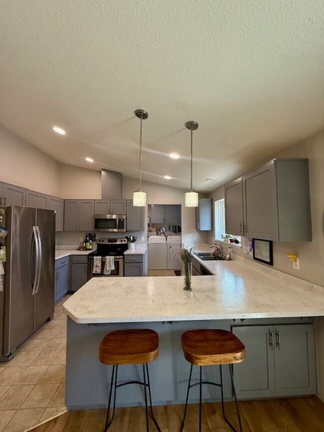 Building Photo - Serene Remodeled 4 Bedroom on Large Lot w/...
