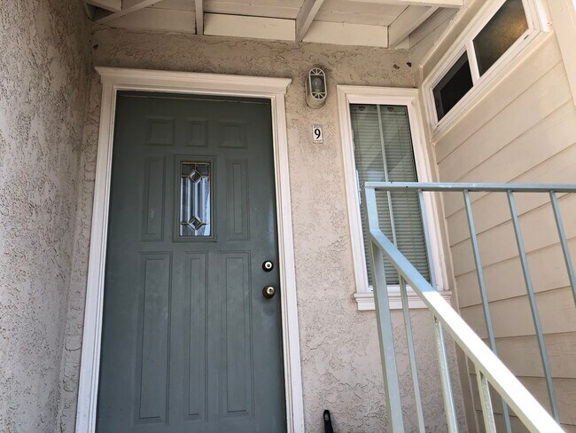 Unit 9 front patio and entry - 5304 Colodny Dr