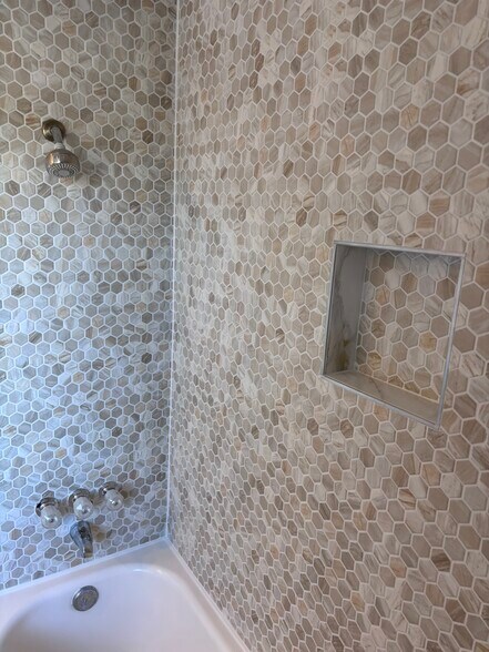 This tile matches the patter of the kitchen backsplash. - 2172 S. Victor St.