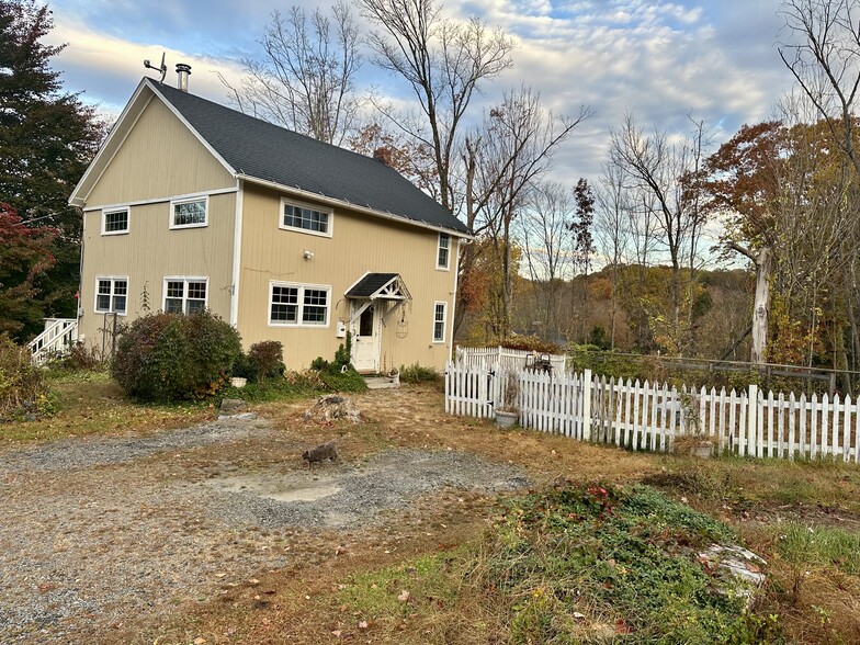 Front with two designated parking spaces - 20 Echo Valley Rd