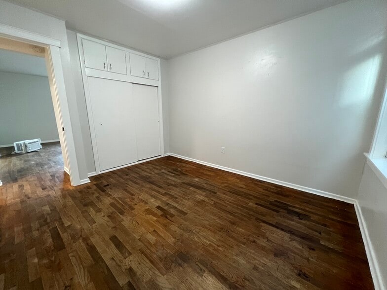 Bedroom with large closet. - 620 6th Ave
