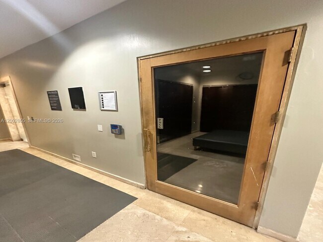 Building Photo - 10275 Collins Ave