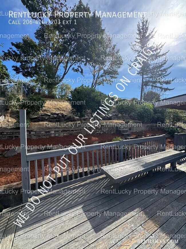 Building Photo - 6718 23rd Ave SW