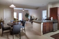 Kitchen, dining, and lounge in one space - The Lodge at BridgeMill