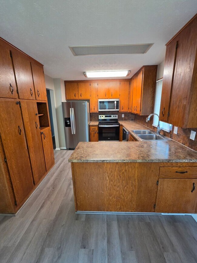 Building Photo - 3/2/1 newly remodeled with a fenced in backyard