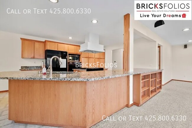 Building Photo - Welcome to Tukwila Haven – Open Concept Home Near Sound Transit!