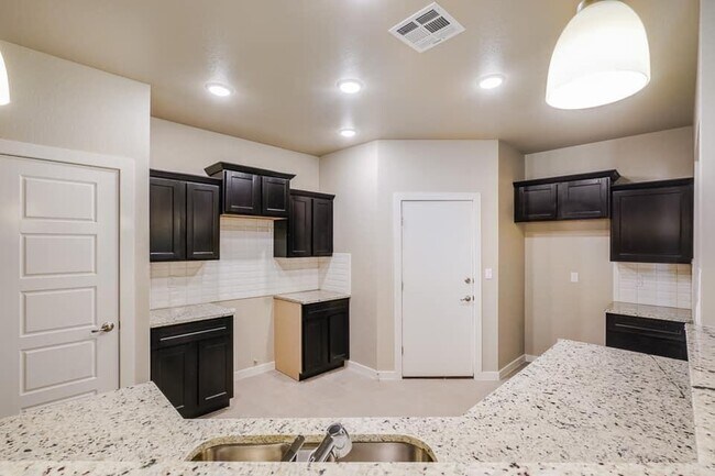 Building Photo - 7747 Enchanted Path Dr