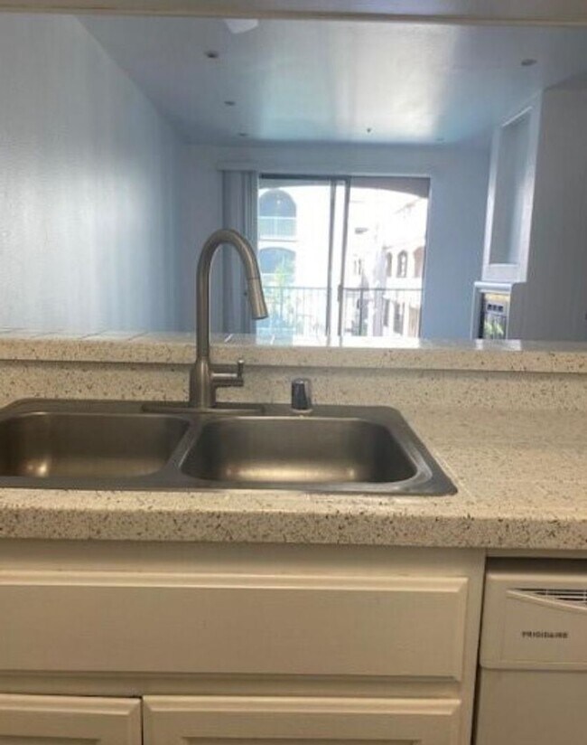 Building Photo - Step into luxury living with this exquisite 2 bedroom 2 bath 3rd floor condo at Emerald Villas