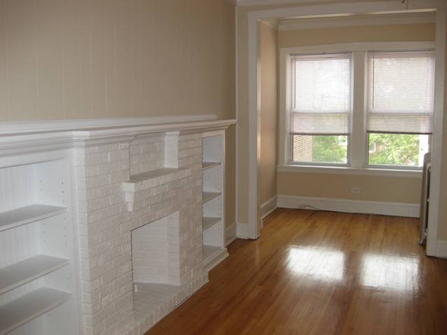 Living room and sunroom (western exposure) - 4700 Lawndale Ave