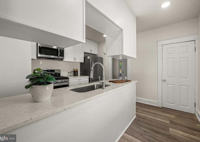 Building Photo - 4409 Wilkens Ave