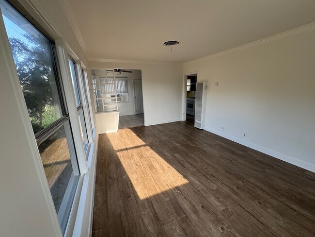 living to dining - 5607 Beck Ave