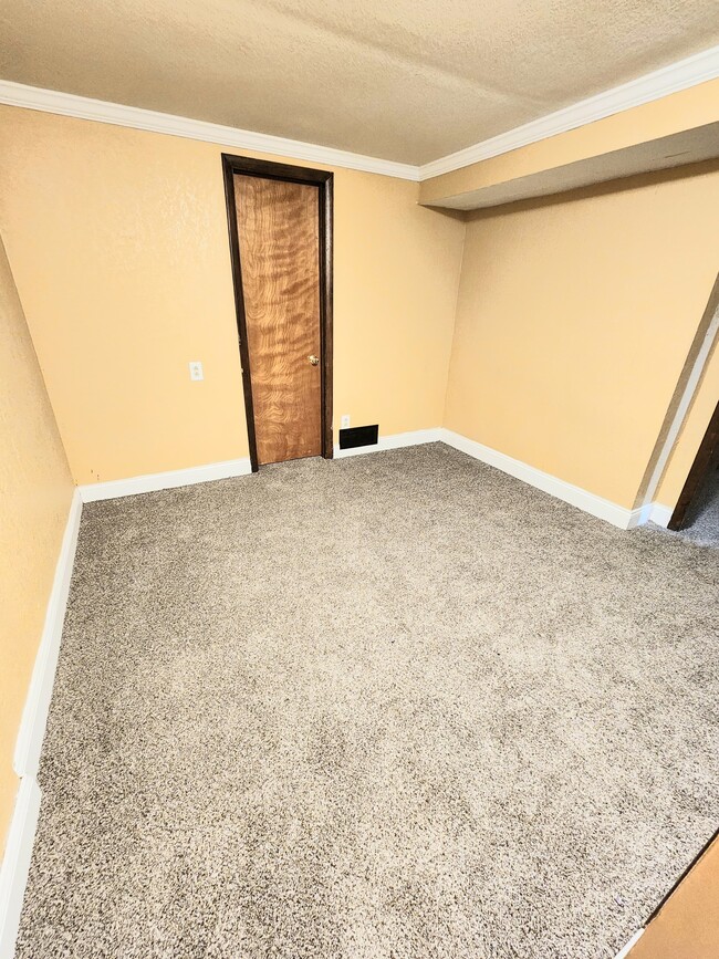 Basement level rooms - 7325 N Brooklyn Ave