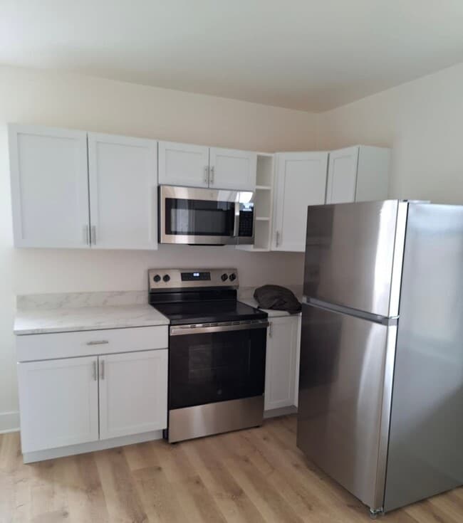 Building Photo - 123-125-125 E 2nd St