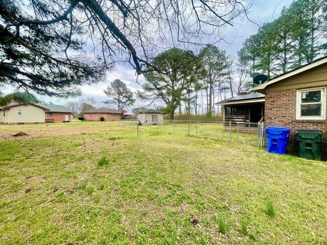 Building Photo - Spacious Home with Large Yard, Hot Tub, and More