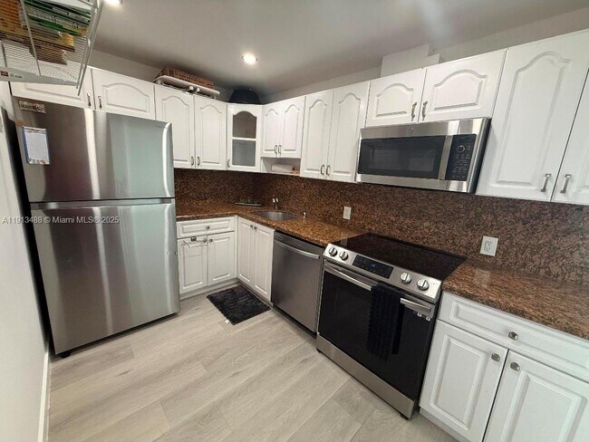 Building Photo - 6969 Collins Ave