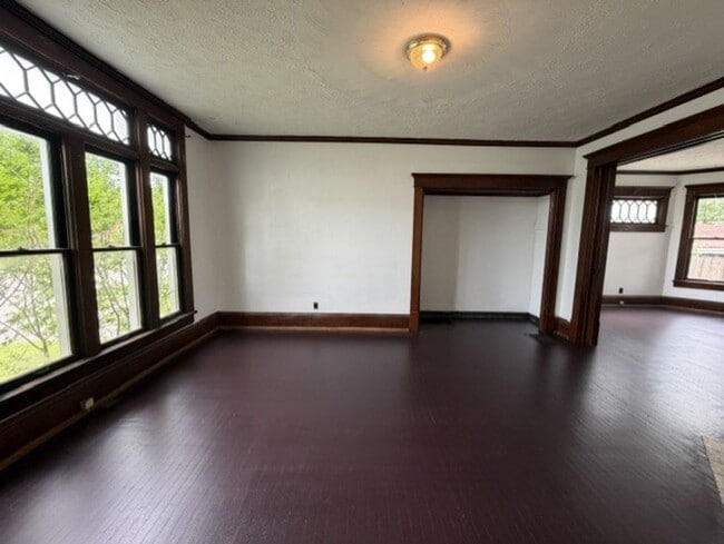 Building Photo - Spacious 4-Bedroom Home with 2 Full Baths, Central A/C & Fenced Yard!